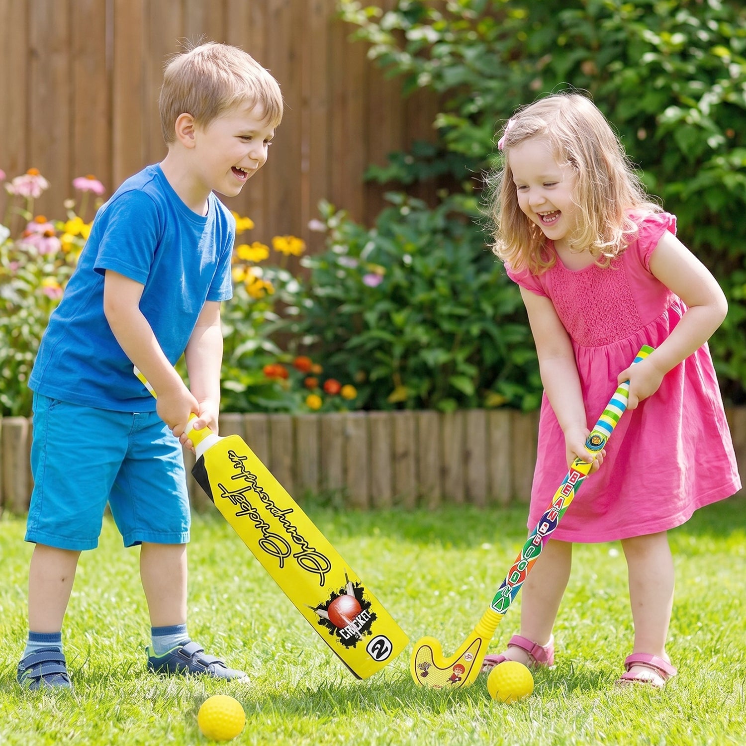 A yellow plastic bat and red ball, essential components of the kids bat ball hockey combo.