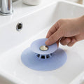 Flexible silicone sink strainer to prevent drain clogging