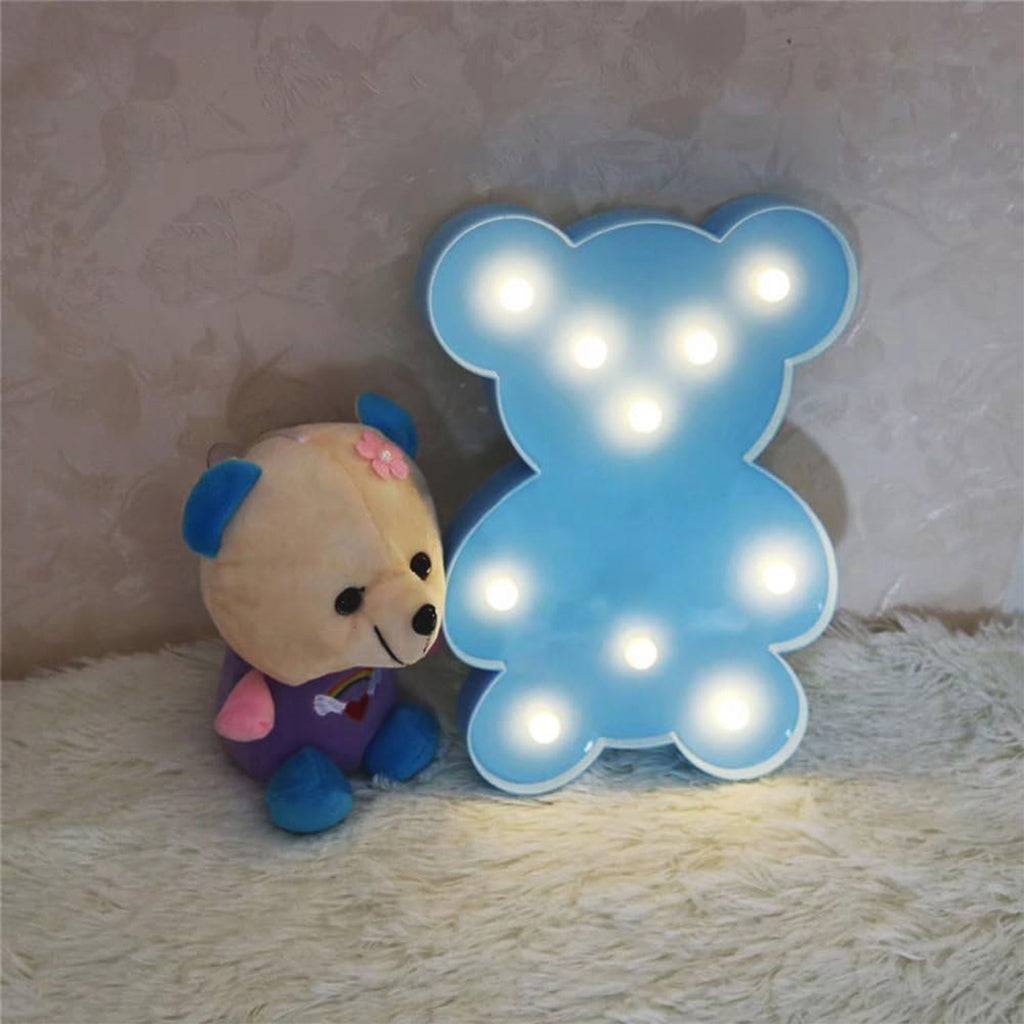 Cute teddy bear shaped LED night light with warm ambient lighting for children’s rooms