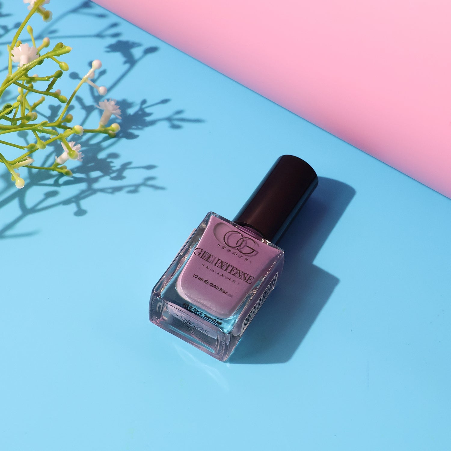 Smooth brush application of Rosy Glow Gel Nail Polish showing intense glossy pigment