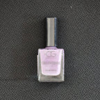 Model showcasing nails with glossy rosy glow gel polish finish from OG Beauty