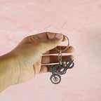 Stylish motorbike themed metal keychain, an ideal gift for riders and bikers.