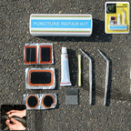 Portable bicycle tire repair kit with patches, adhesive, and tools in compact case