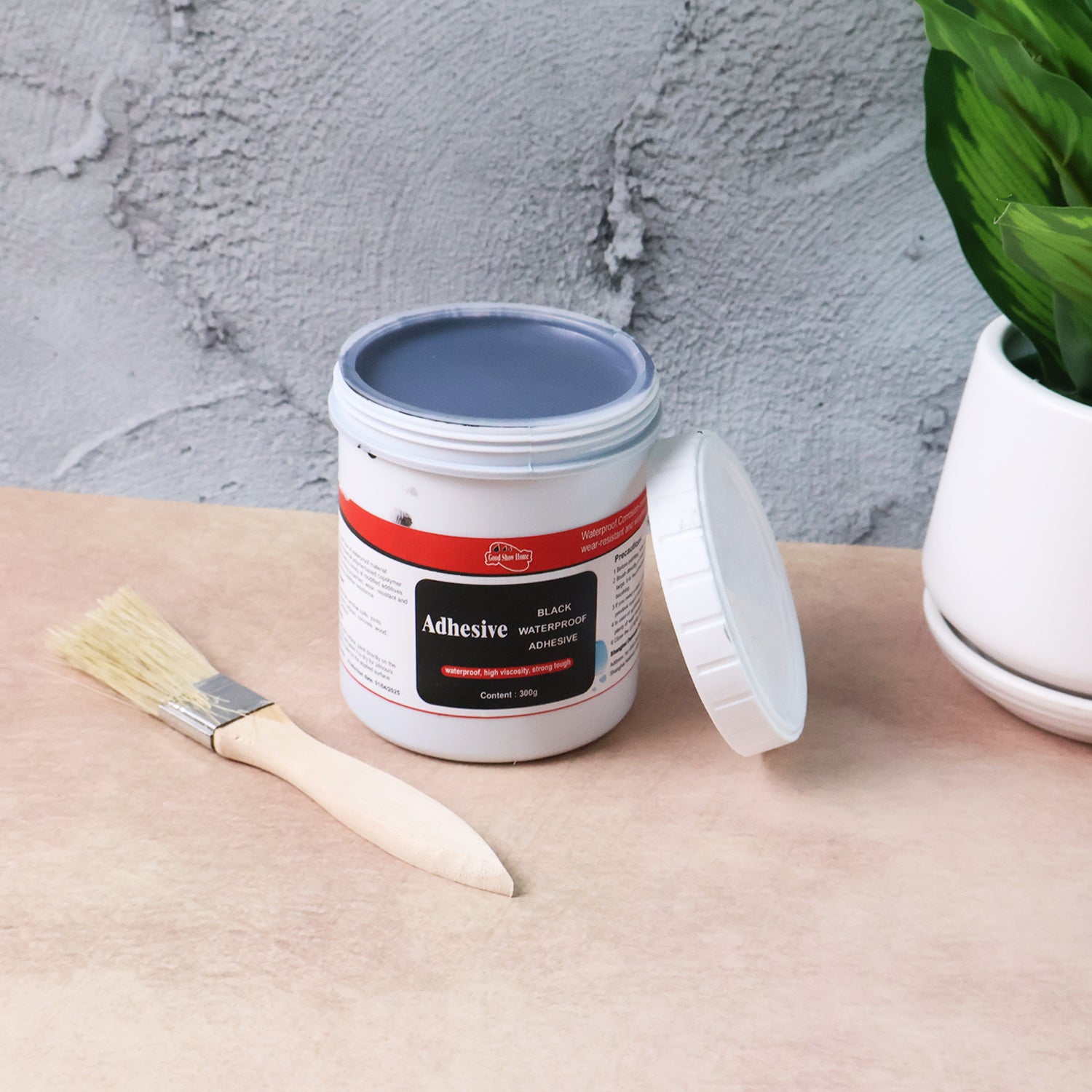 Side view of black waterproof adhesive paste for construction sealant use