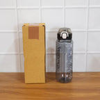 Active use of 1000 ML sports water bottle during workout