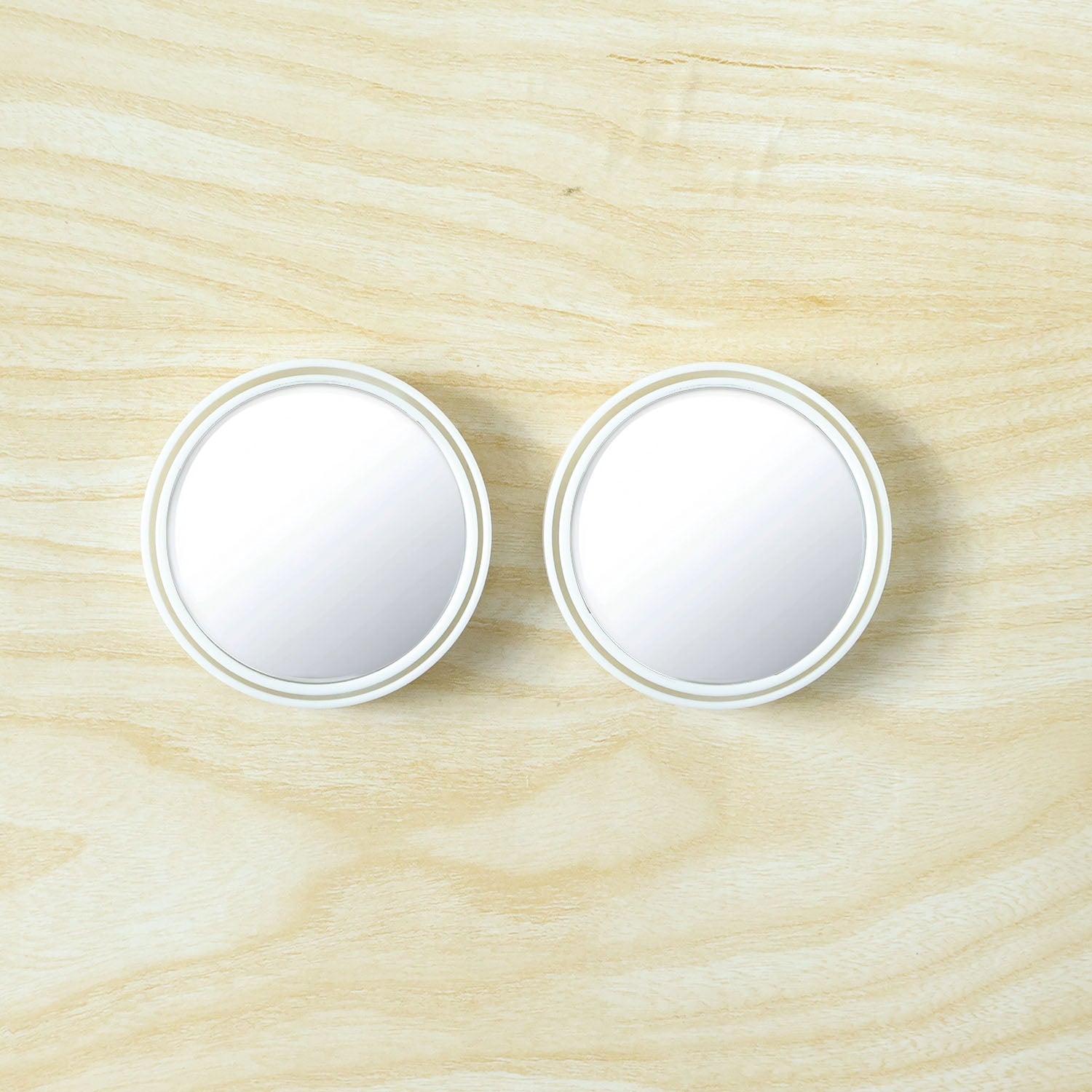 Two white round blind spot mirrors displayed front-facing