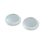 Close-up view of white round car blind spot mirror