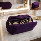 Blue waterproof travel makeup organizer bag with spacious interior
