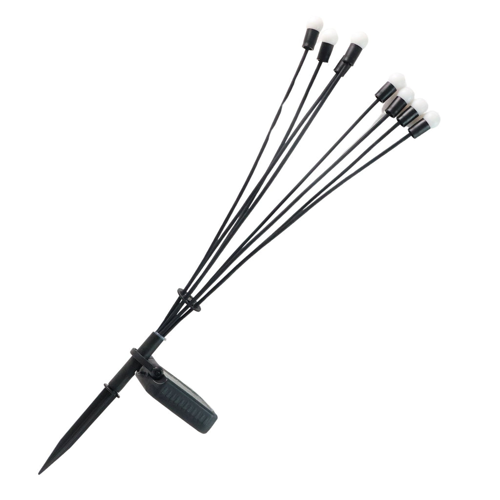 Solar LED fiber optic strands glowing brightly in outdoor setting