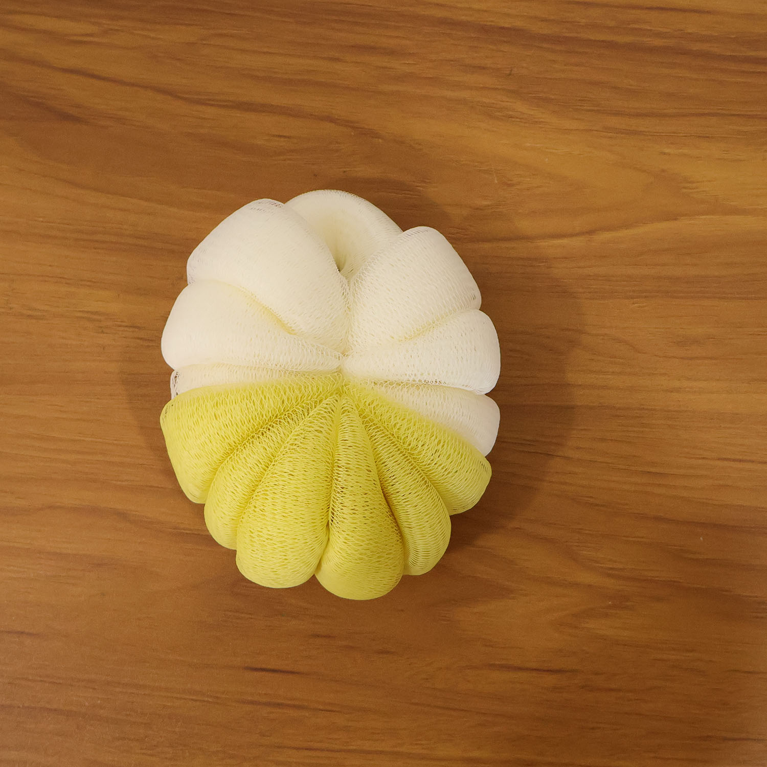 Soft mesh bath loofah on display for bath and shower use