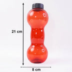 Dumbbell shaped water bottle placed on gym equipment