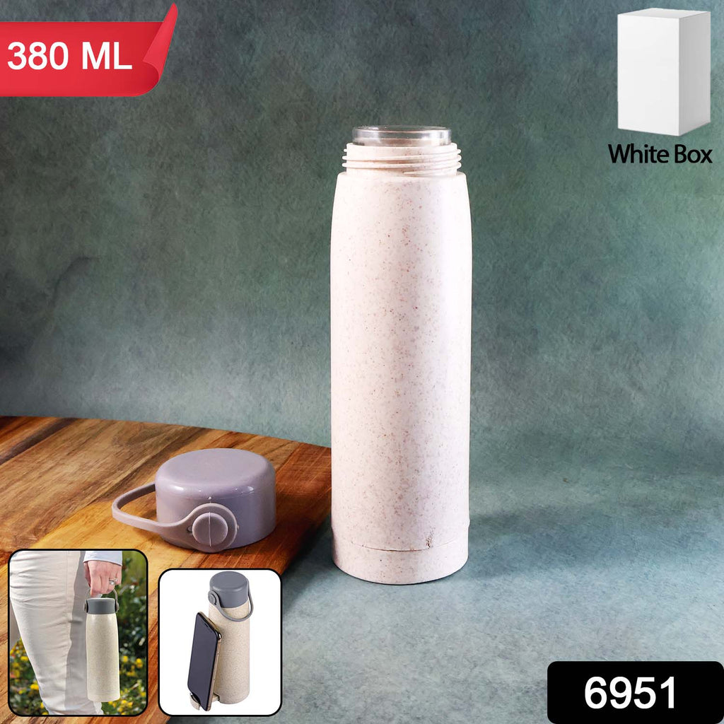 Side angle of the borosilicate glass water bottle, showcasing its sleek design and phone holder.