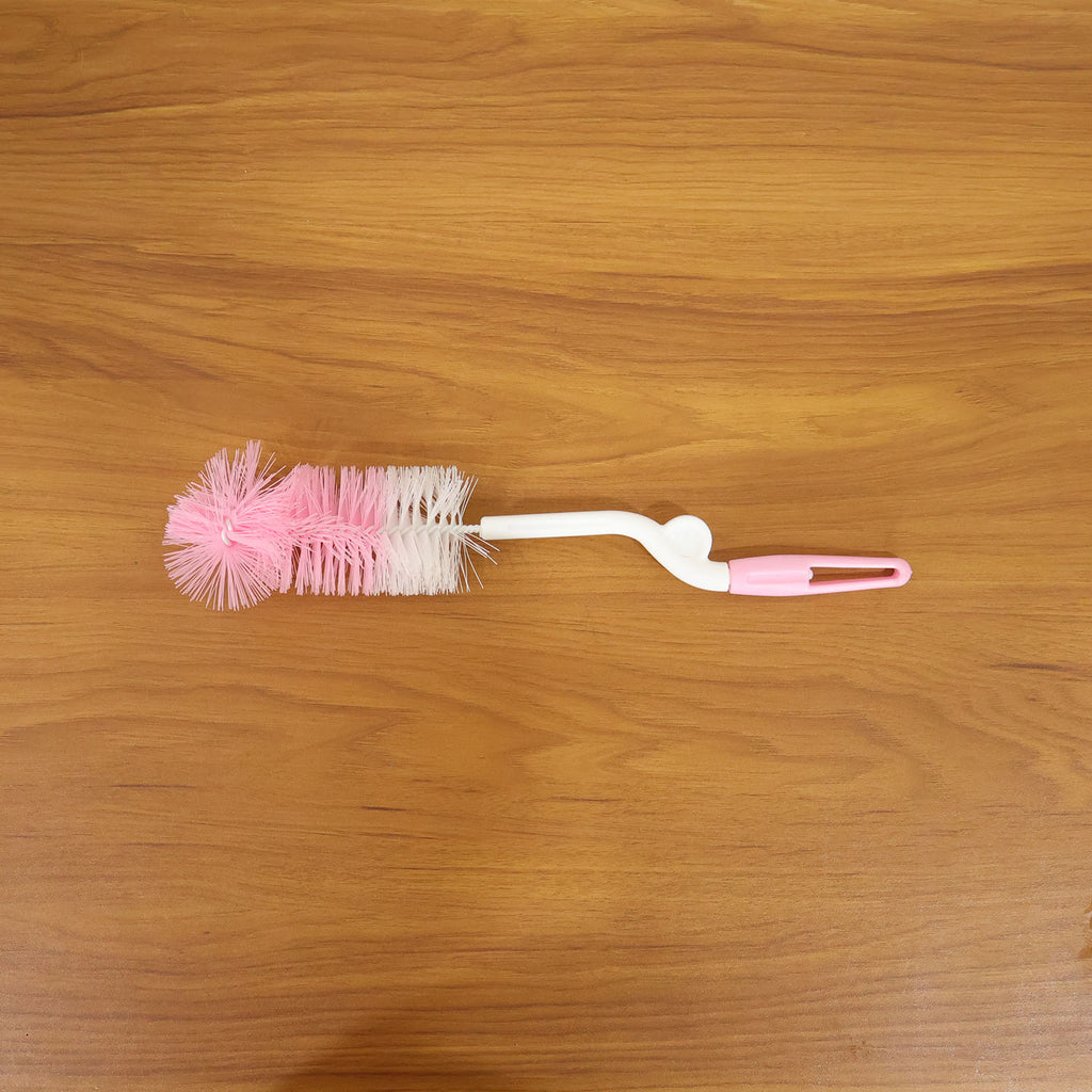 Bottle cleaning brush in use with 360 degree rotary handle