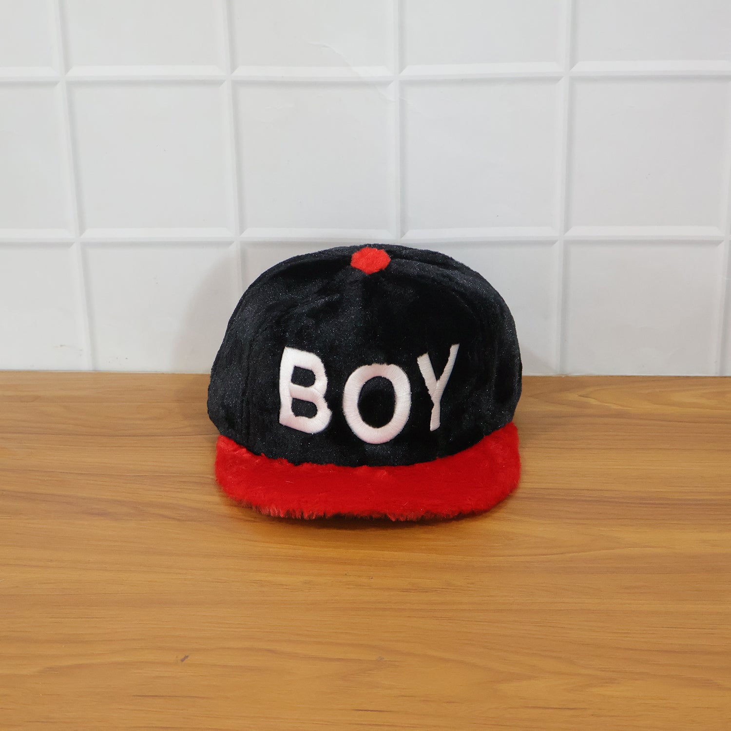 Lifestyle image of boys printed cap suitable for everyday wear