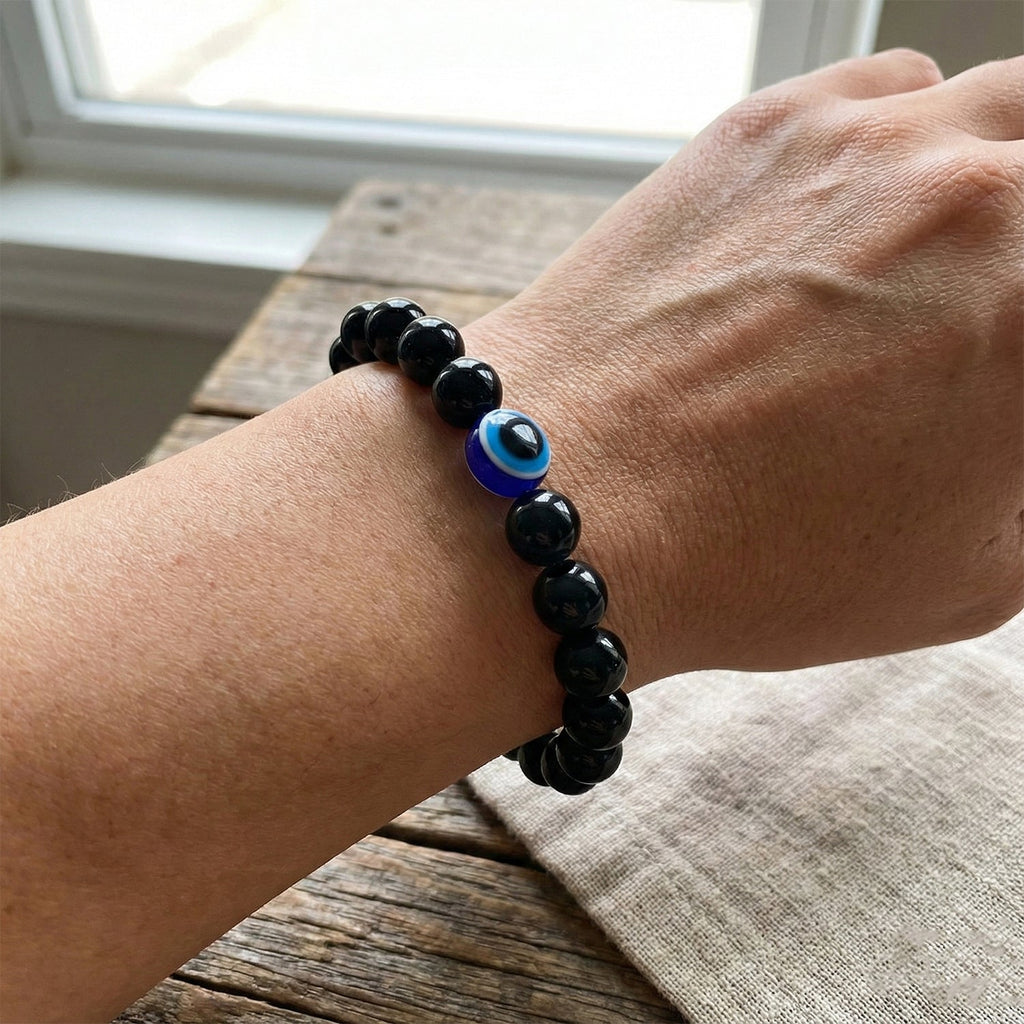 Side angle showing elastic band and dual-tone beads on bracelet