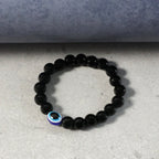 Close-up detail of elegant dual-tone beads on beaded stretch bracelet