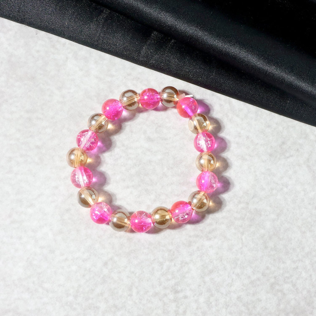 Close-up of crystal beaded bracelet featuring dual-tone design