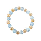 Display of crystal beaded dual-tone stretch bracelet