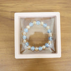 Live wrist view of elegant dual-tone crystal beaded stretch bracelet