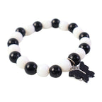 Stylish black and white bracelet displayed on clean white background