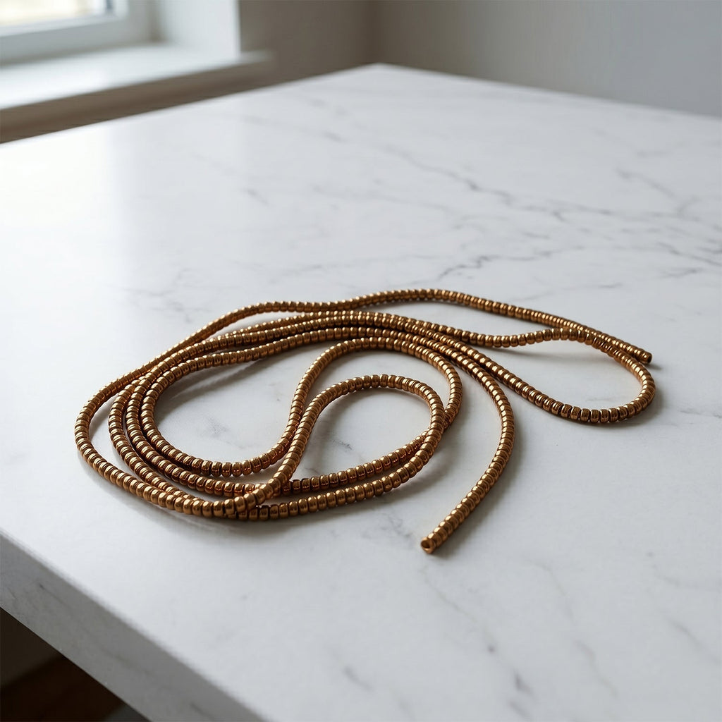 Brown spiral cable protector sleeve detail highlighting flexible cord saver