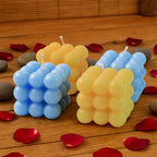 Colorful cube candles displayed for stylish home décor
