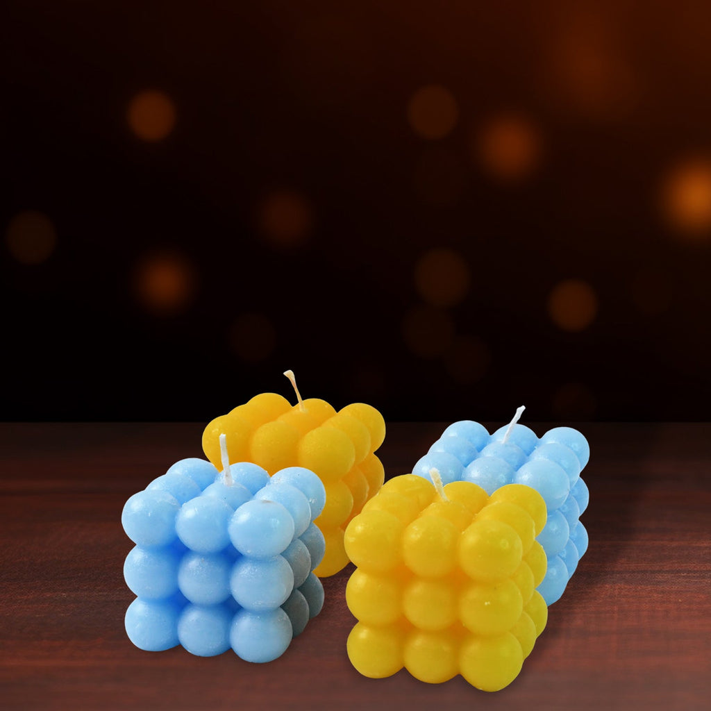 Blue and yellow cube candles with unique bubble design for home decoration