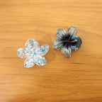 Floral hair clip worn with casual hairstyle