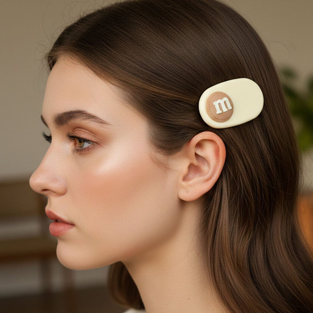 Single stylish alphabet letter hair clip showcasing raised letter feature