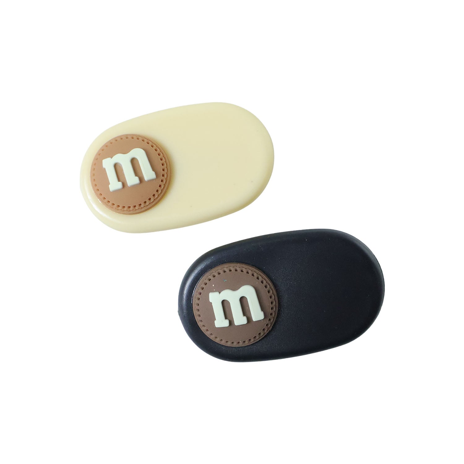 Side view of lightweight oval alphabet letter snap hair clips set