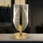 Side view of modern crystal table lamp with warm ambient light