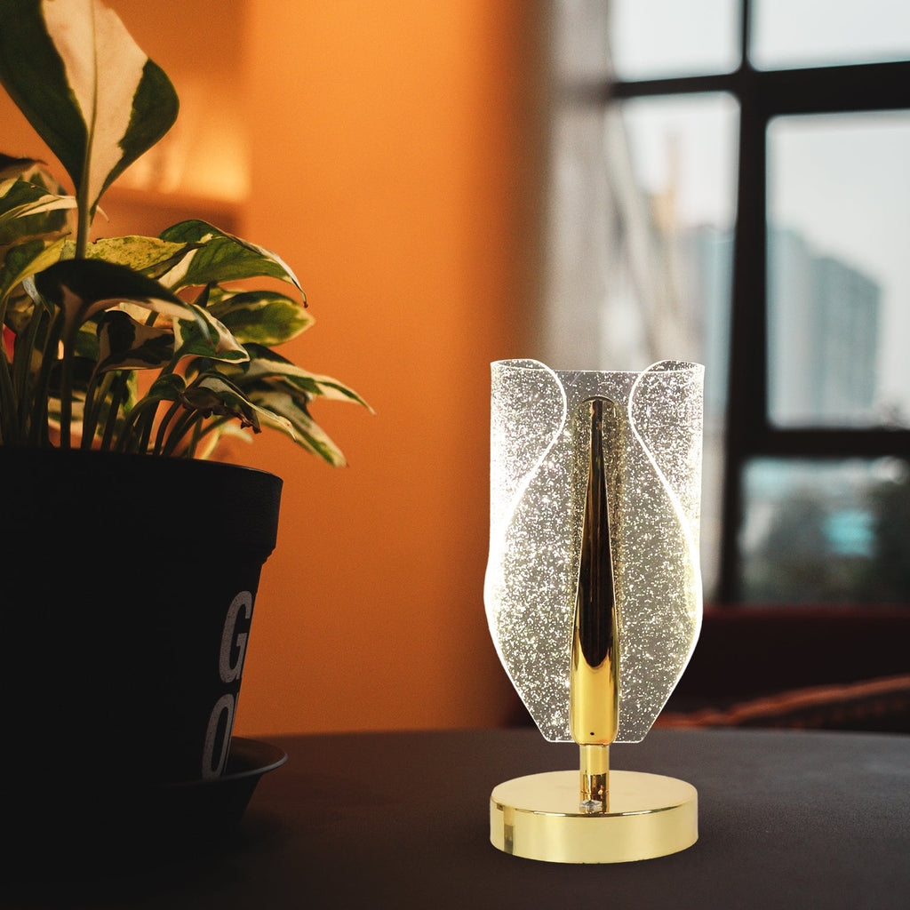 Crystal-cut LED table lamp with metallic base for home décor