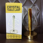 Crystal table lamp featured in office setting with USB charging