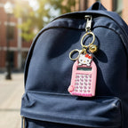 Digital calculator keychain featuring cute cartoon cat and clear keypad