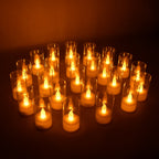 Set of 24 LED flameless candles with transparent covers creating warm glow
