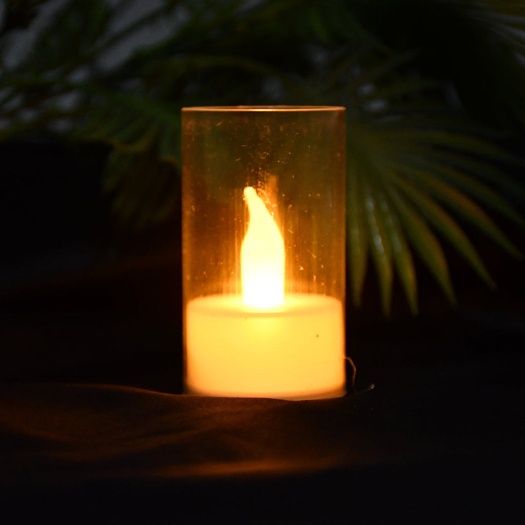 Video showing flickering LED flameless candles with transparent plastic covers