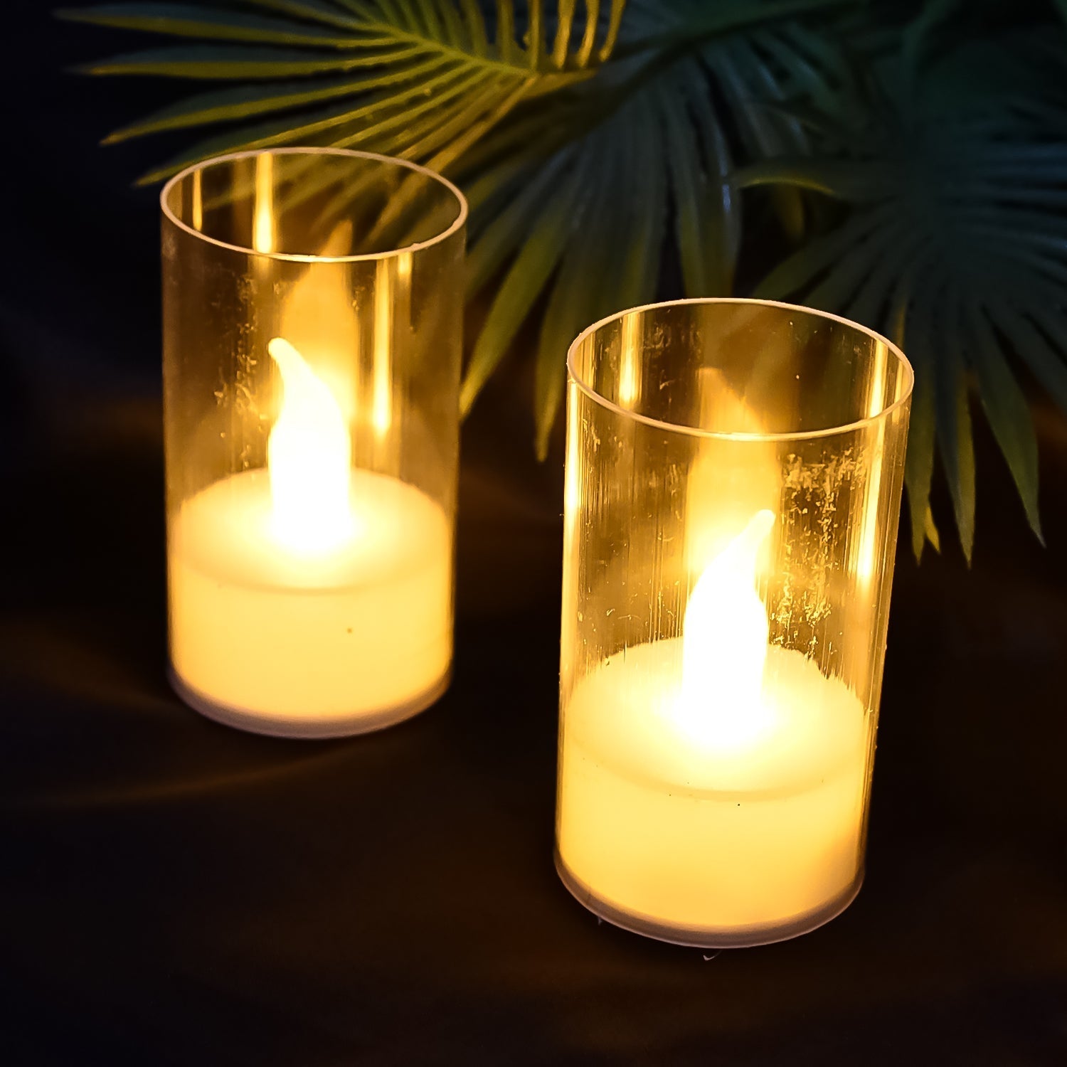 Single LED flameless candle with transparent plastic cover emitting soft light