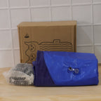 Inflatable car bed setup with cushions, ready for camping or travel