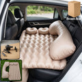 Inflated car air mattress in rear seat for travel comfort