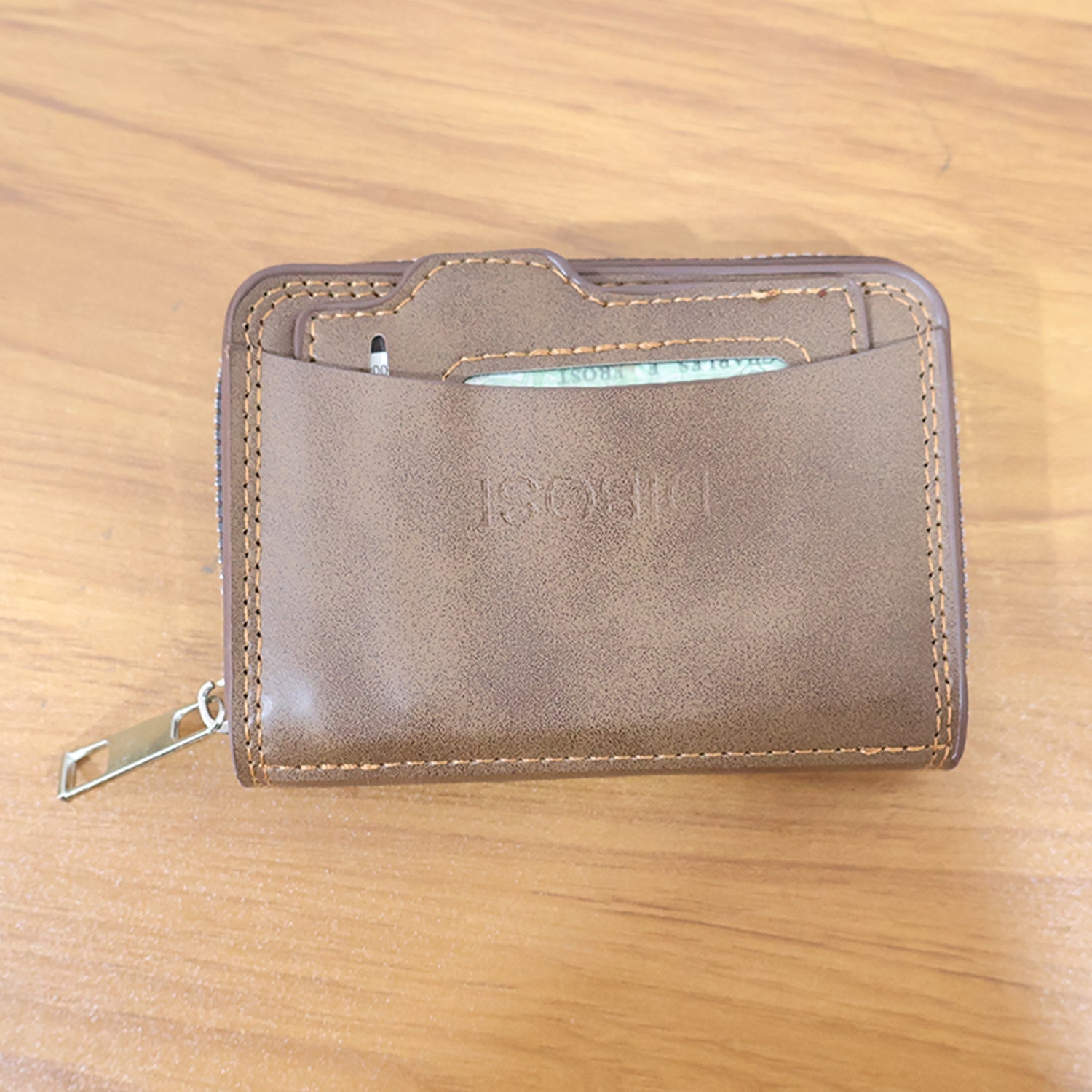 Compact zip closure card holder wallet fitting comfortably in hand