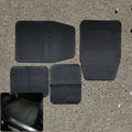 Set of 4 heavy-duty waterproof car floor mats with deep grooves for dust and mud protection