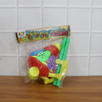 Joyful toddler playing with colorful chicken push toy enhancing coordination