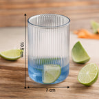 Top view of six Supermom ribbed plastic glasses in a set