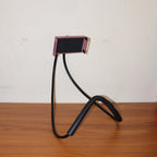Person using flexible neck phone holder for live streaming hands-free