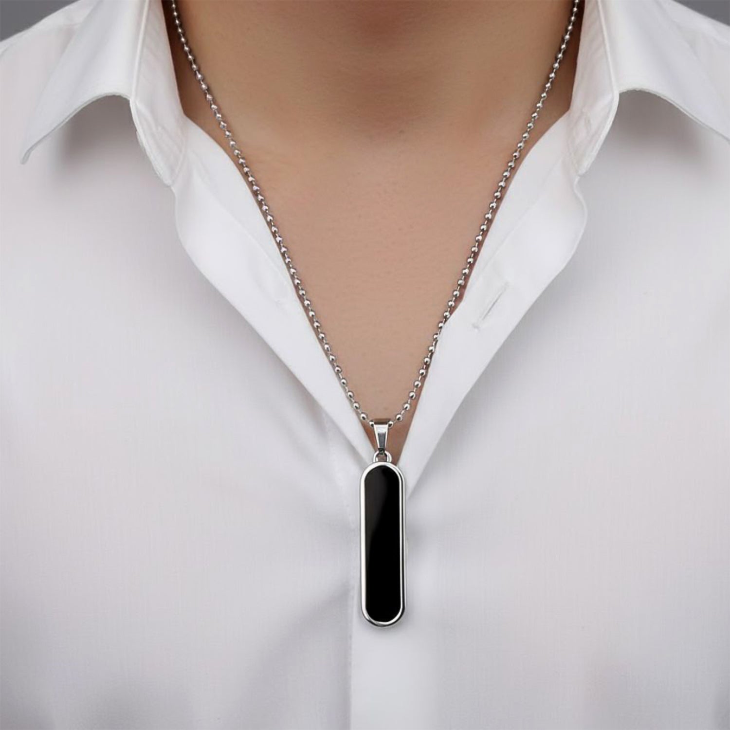 Glossy minimalist bar pendant showing smooth rounded edges