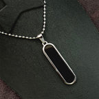 Stylish minimalist necklace pendant with polished metal finish