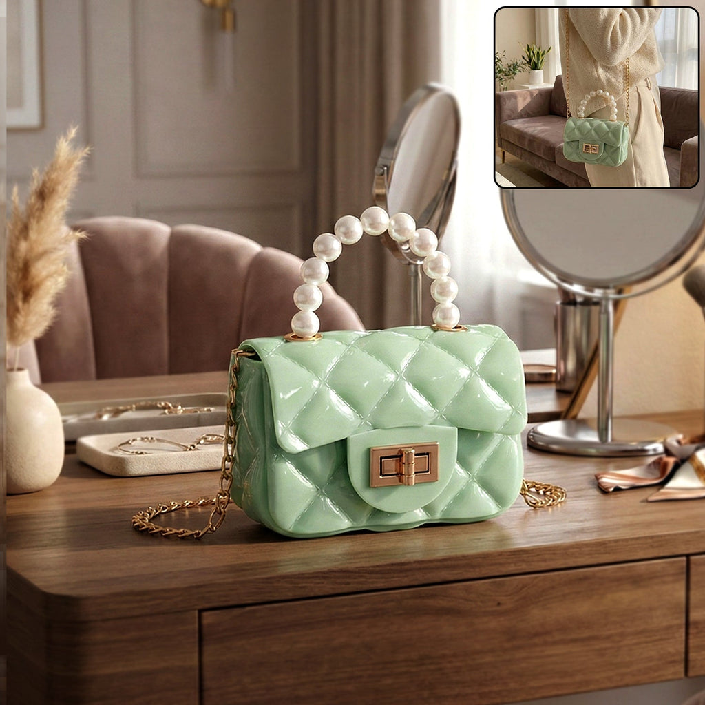 Quilted mini handbag showcasing elegant pearl handle and gold chain strap