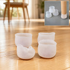 Silicone furniture feet pads on chair legs protecting floor from scratches