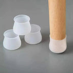 Transparent silicone pads attached to various furniture legs enhancing stability
