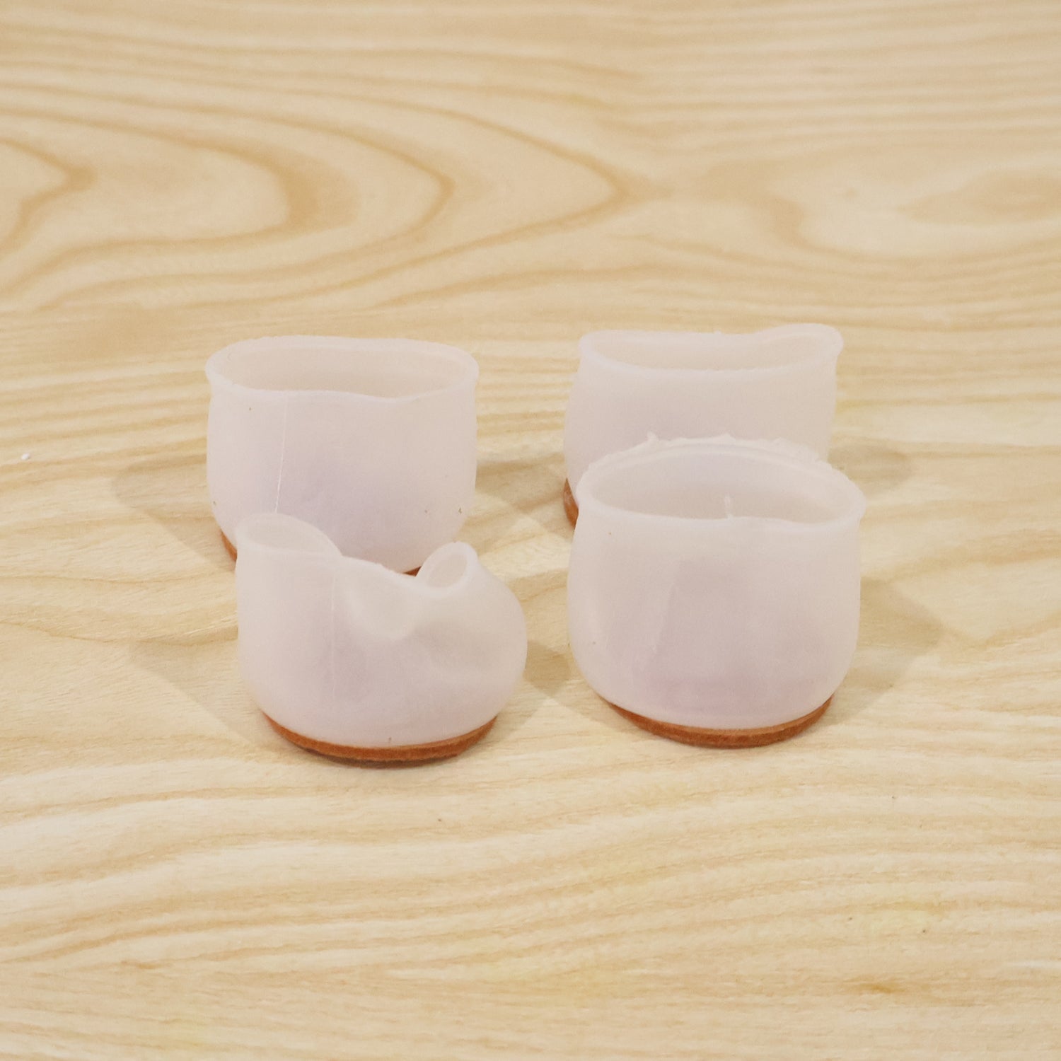 Silicone chair leg covers designed to protect floors and reduce noise